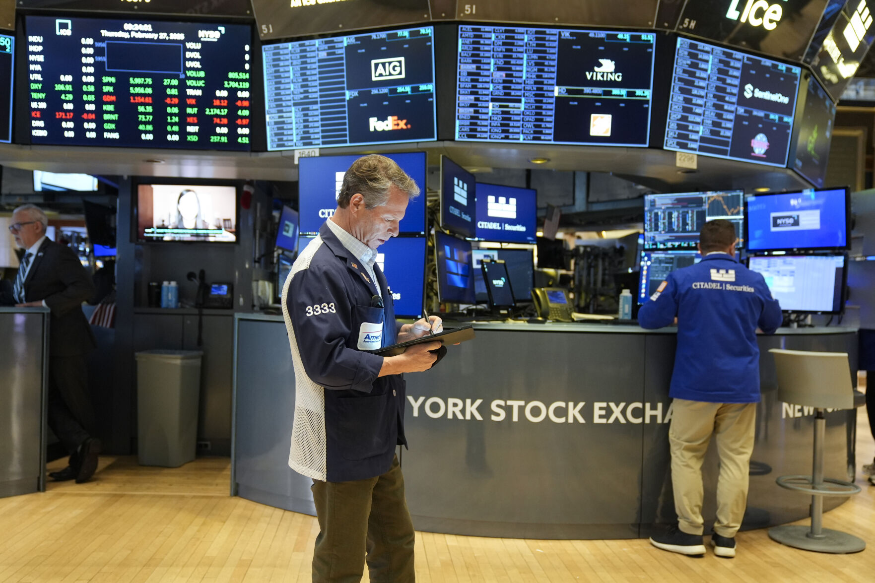 Wall Street hits records following an encouraging update on inflation